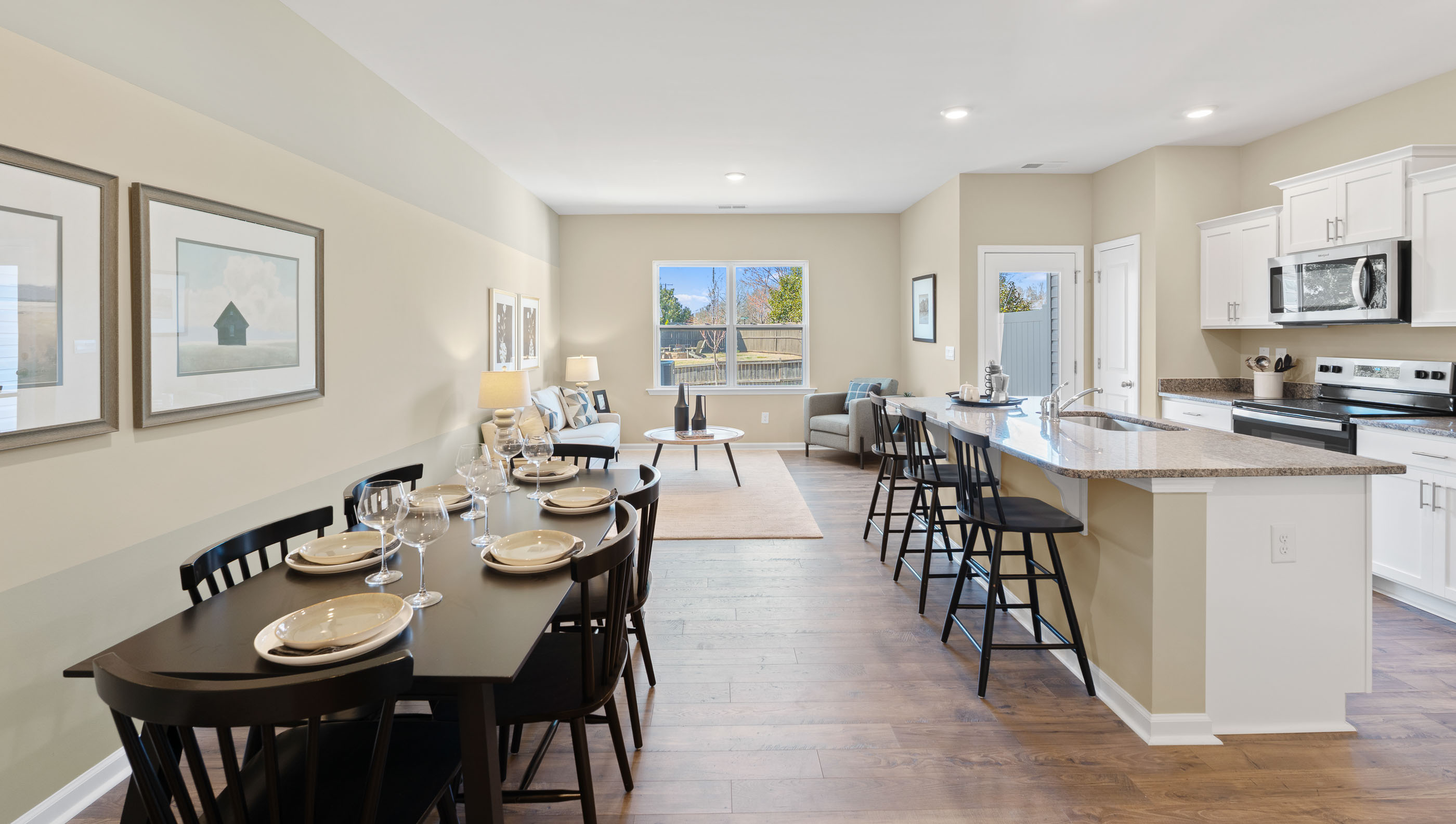 Livinging room with dining room view.