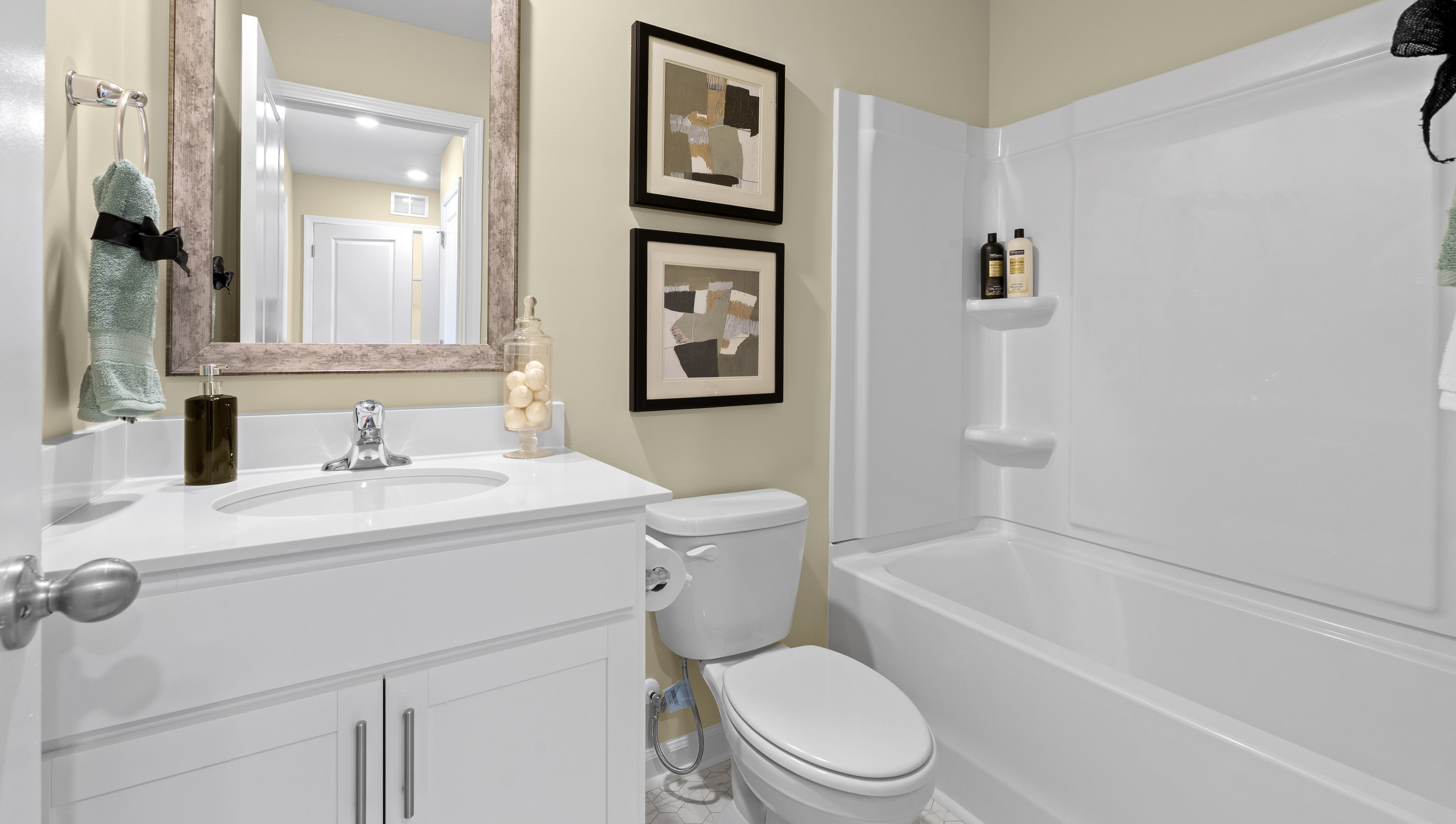 Bathroom with vanity and tub.