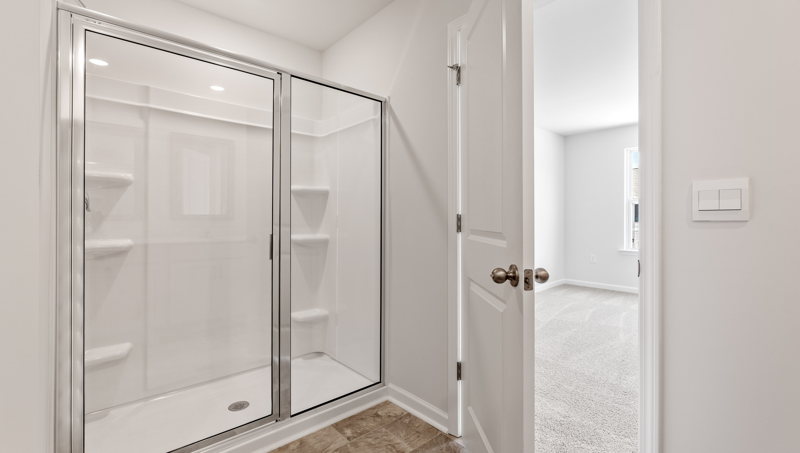 Bathroom with shower and vanity.