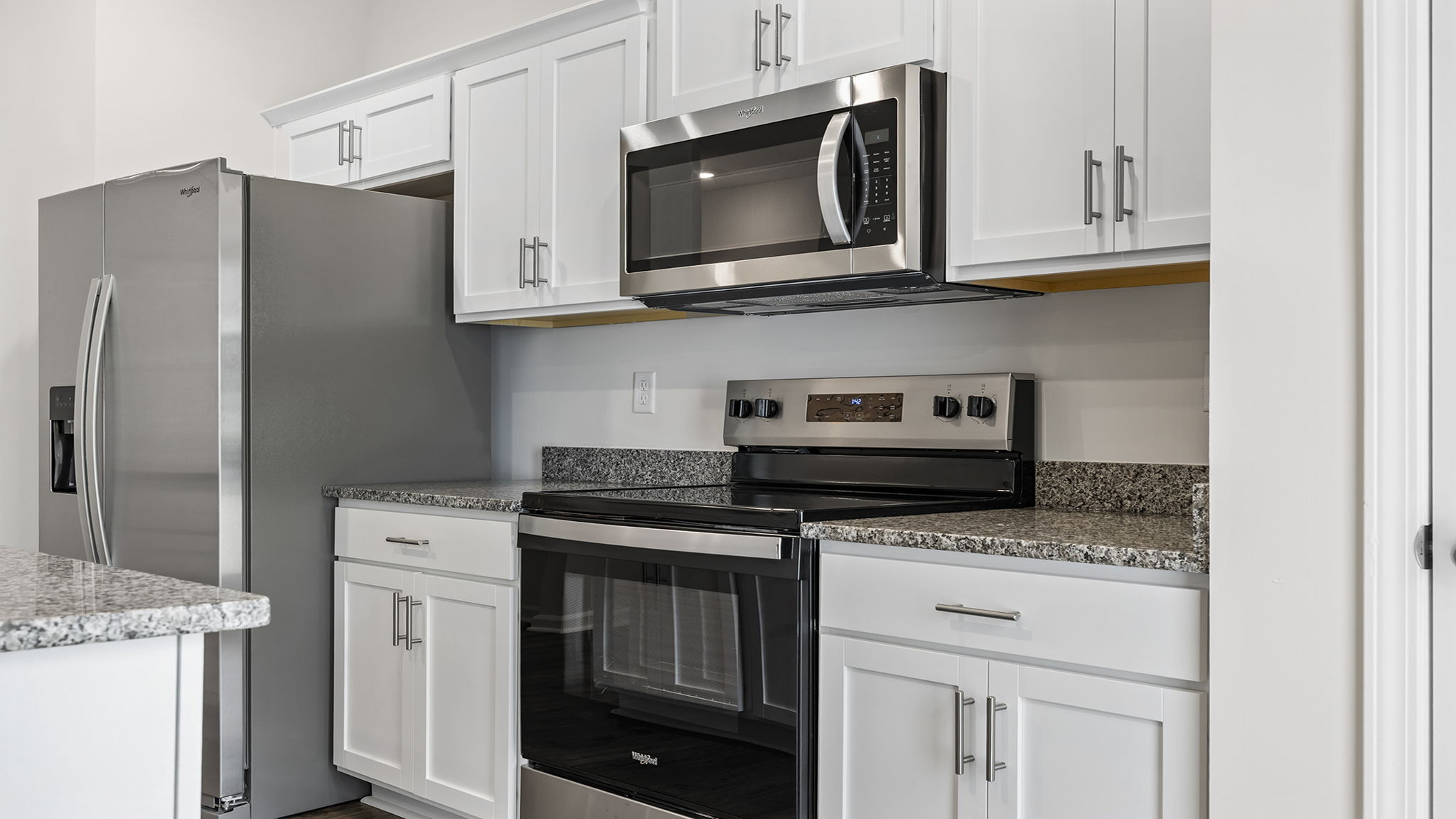 Kitchen with countertops and island.