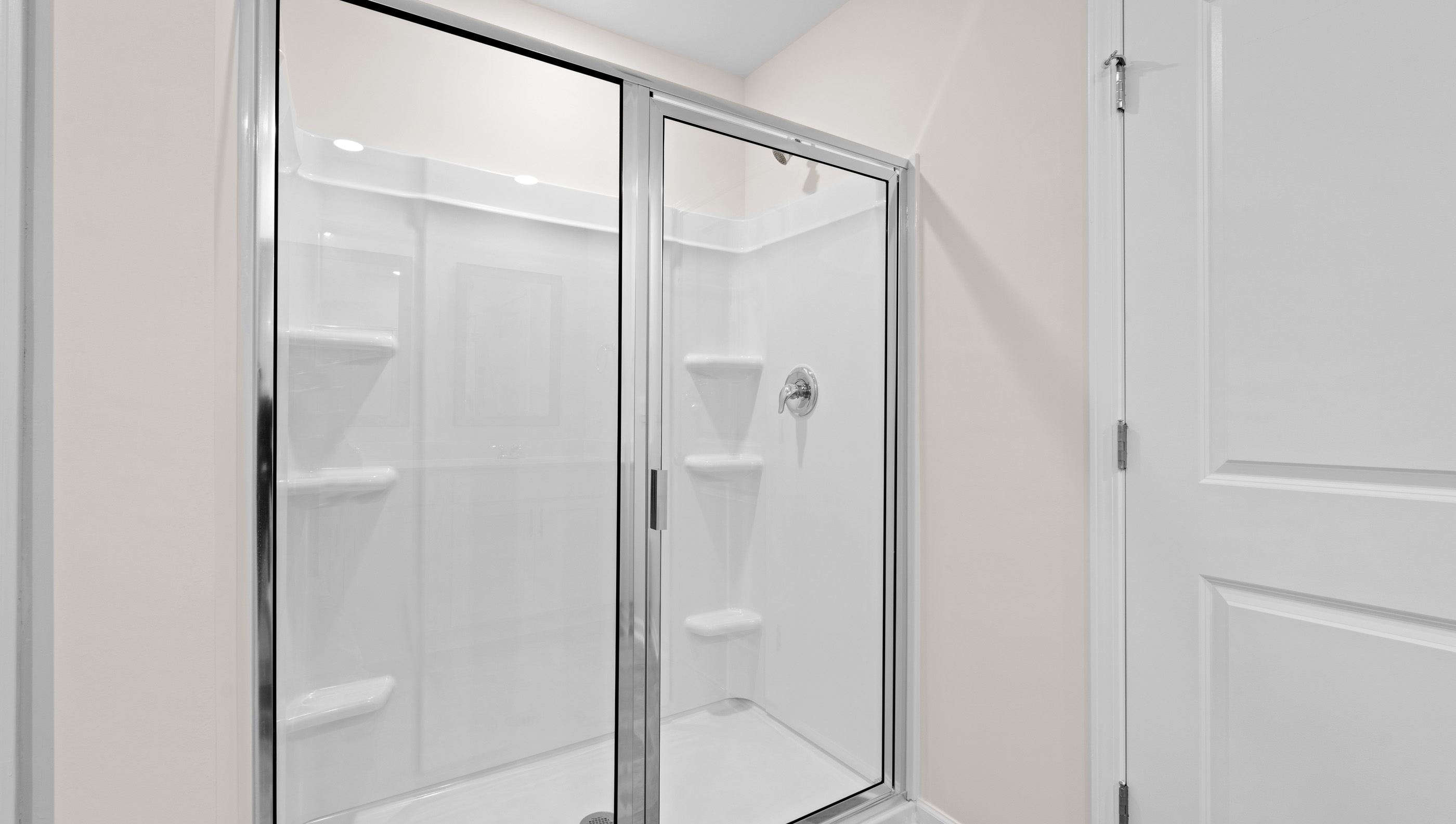 Bathroom with walk in shower.