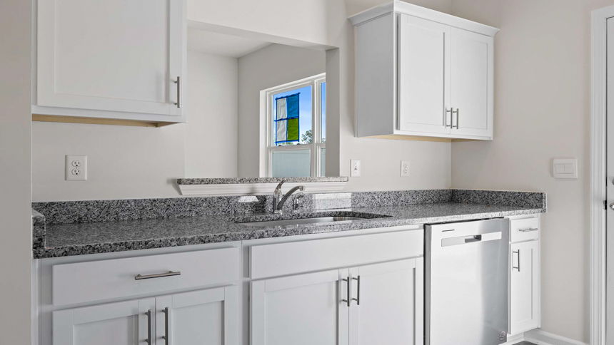 Kitchen with doors to exterior.