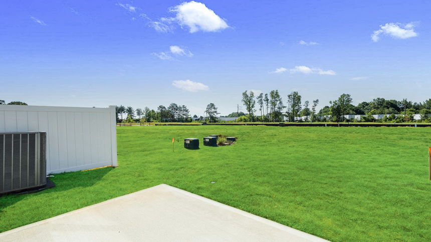 Large backyard of home.