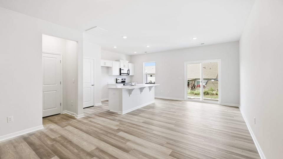 Livingroom with view of kitchen.