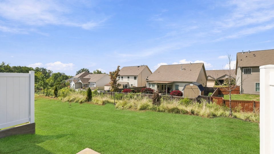 Large backyard of home.