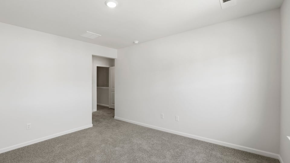 Bathroom with walk in shower.