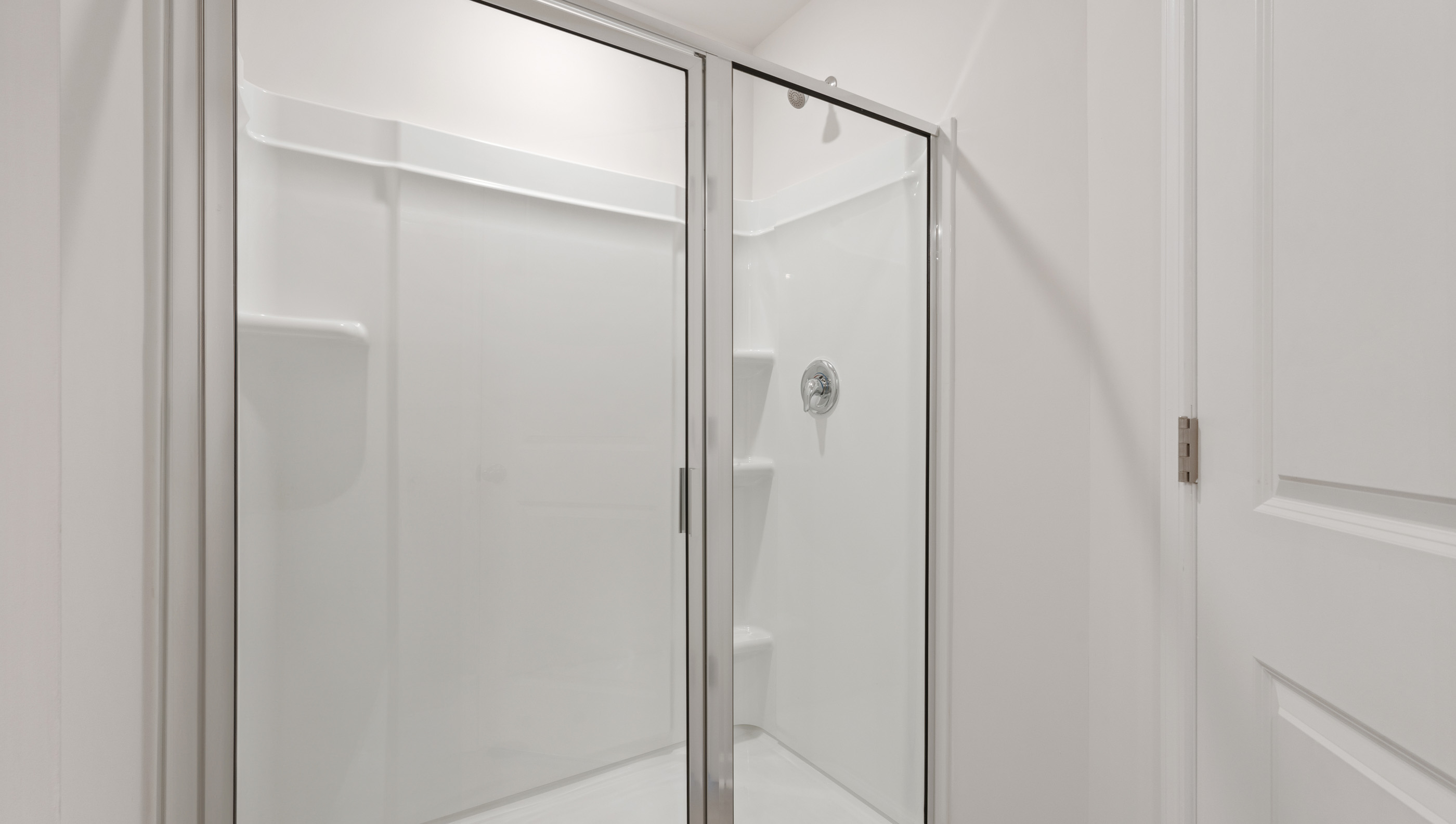 Bathroom with walk in shower.