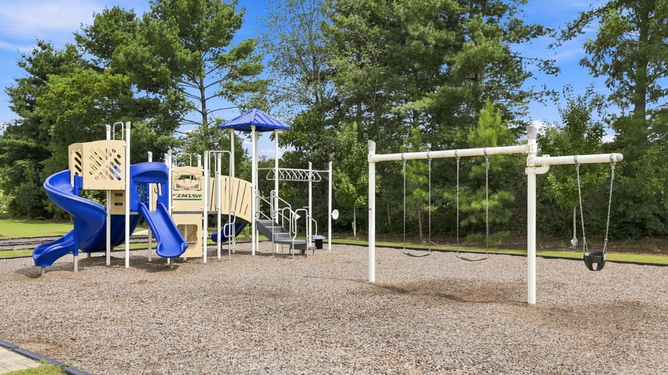 Playground with slides and swing.