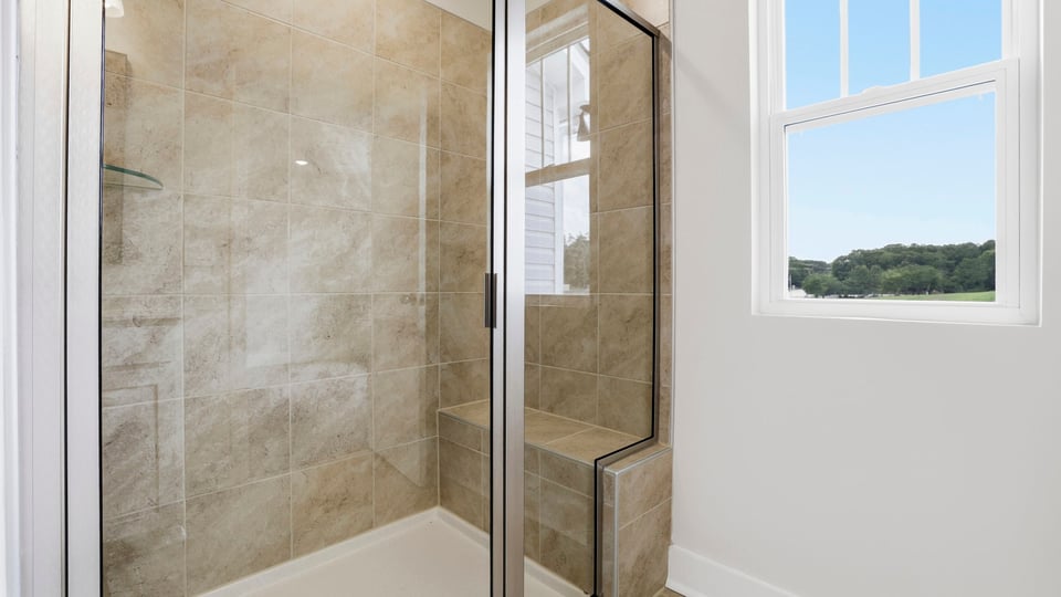 Primary bathroom with double vanity sink.