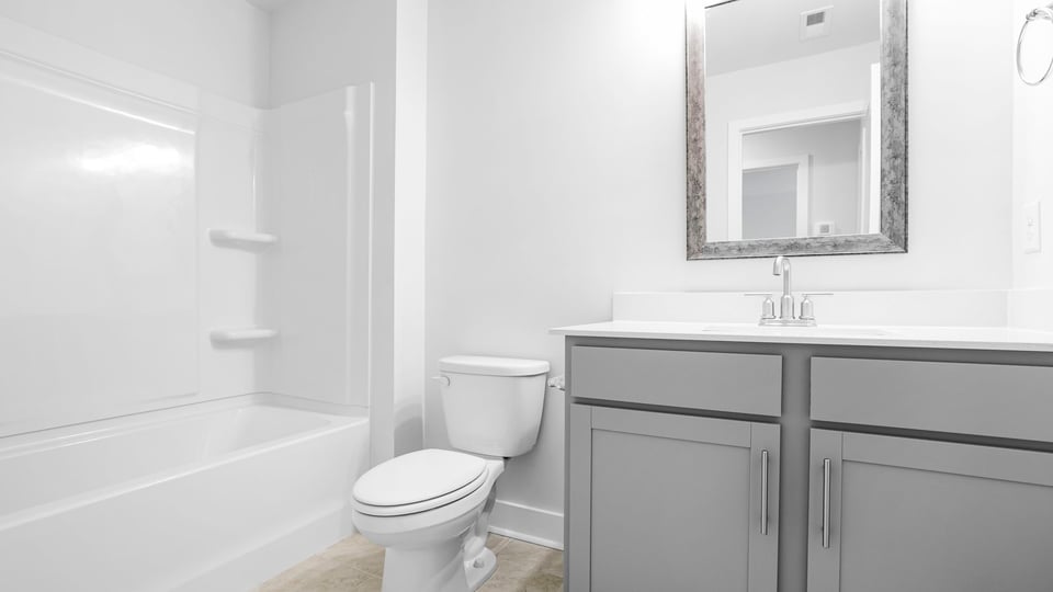Bathroom with double vanity sinks.