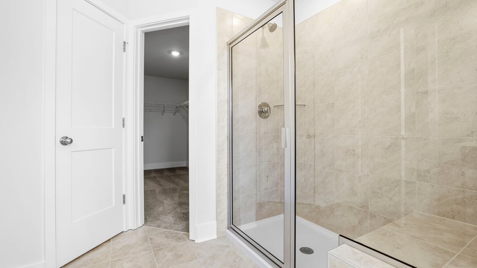 Primary bathroom with double vanity sinks.