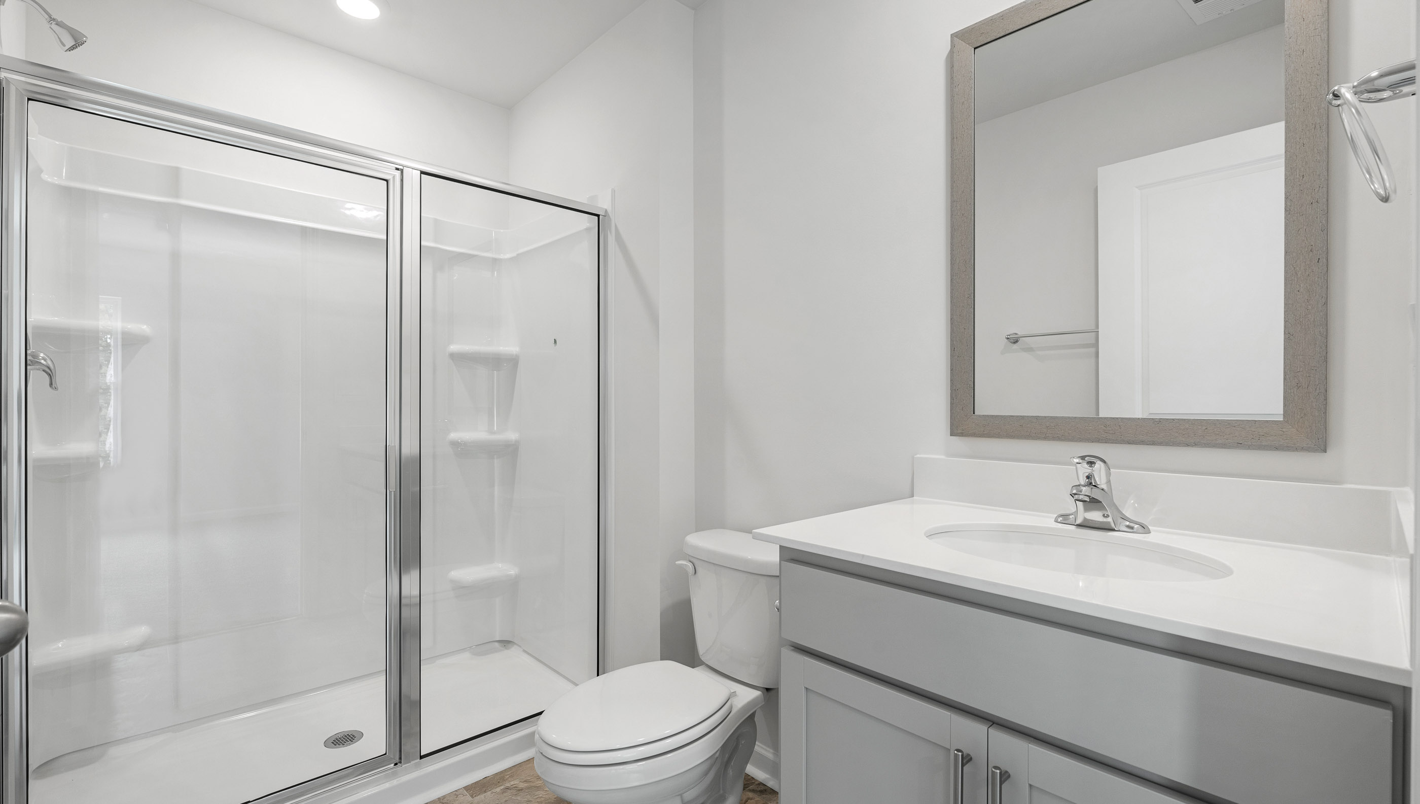 Bathroom with single vanity sink and shower.