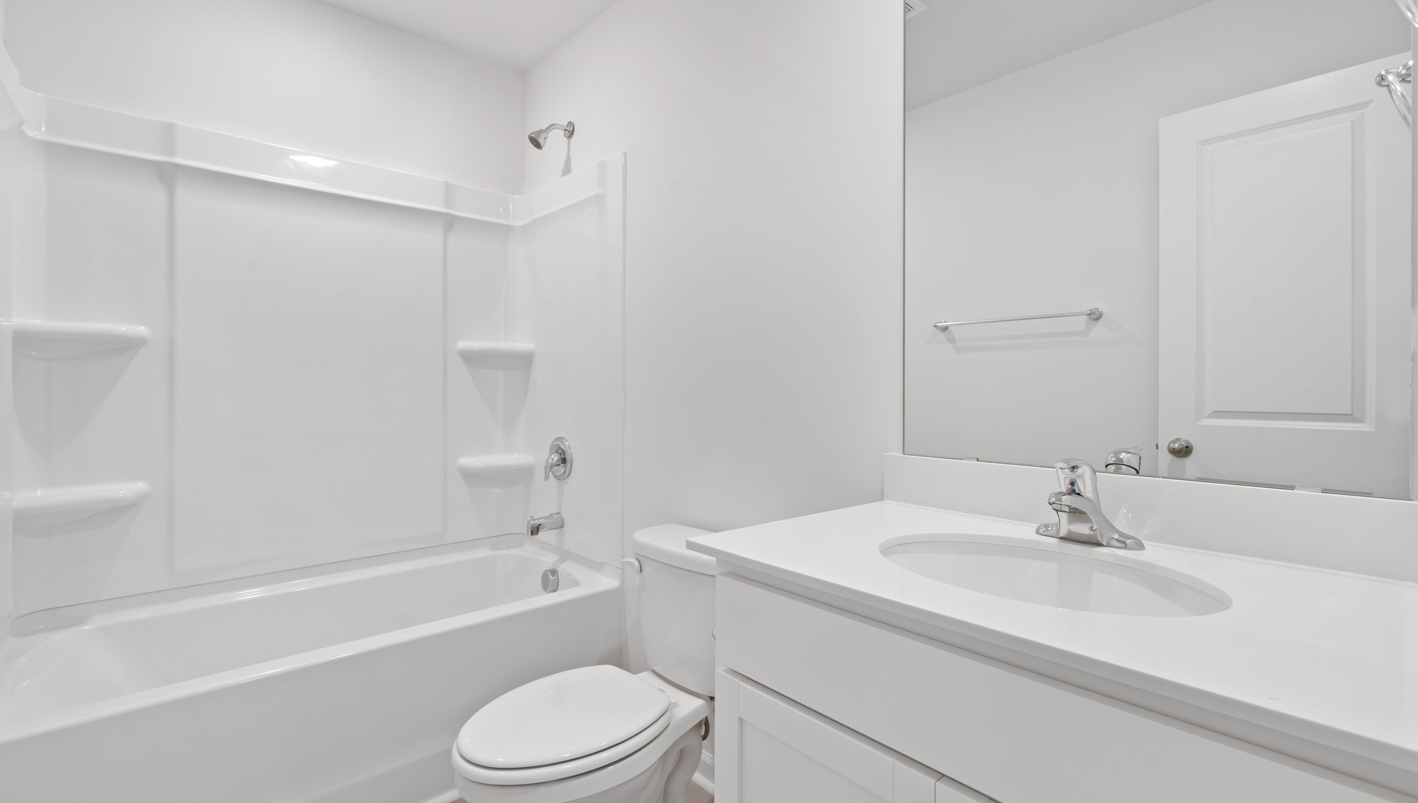 Bathroom with tub and toilet.