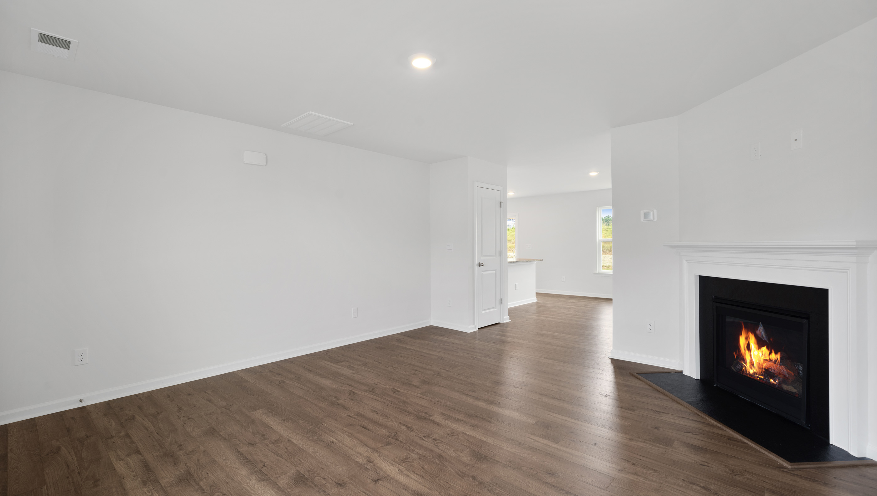Family room with fireplace.