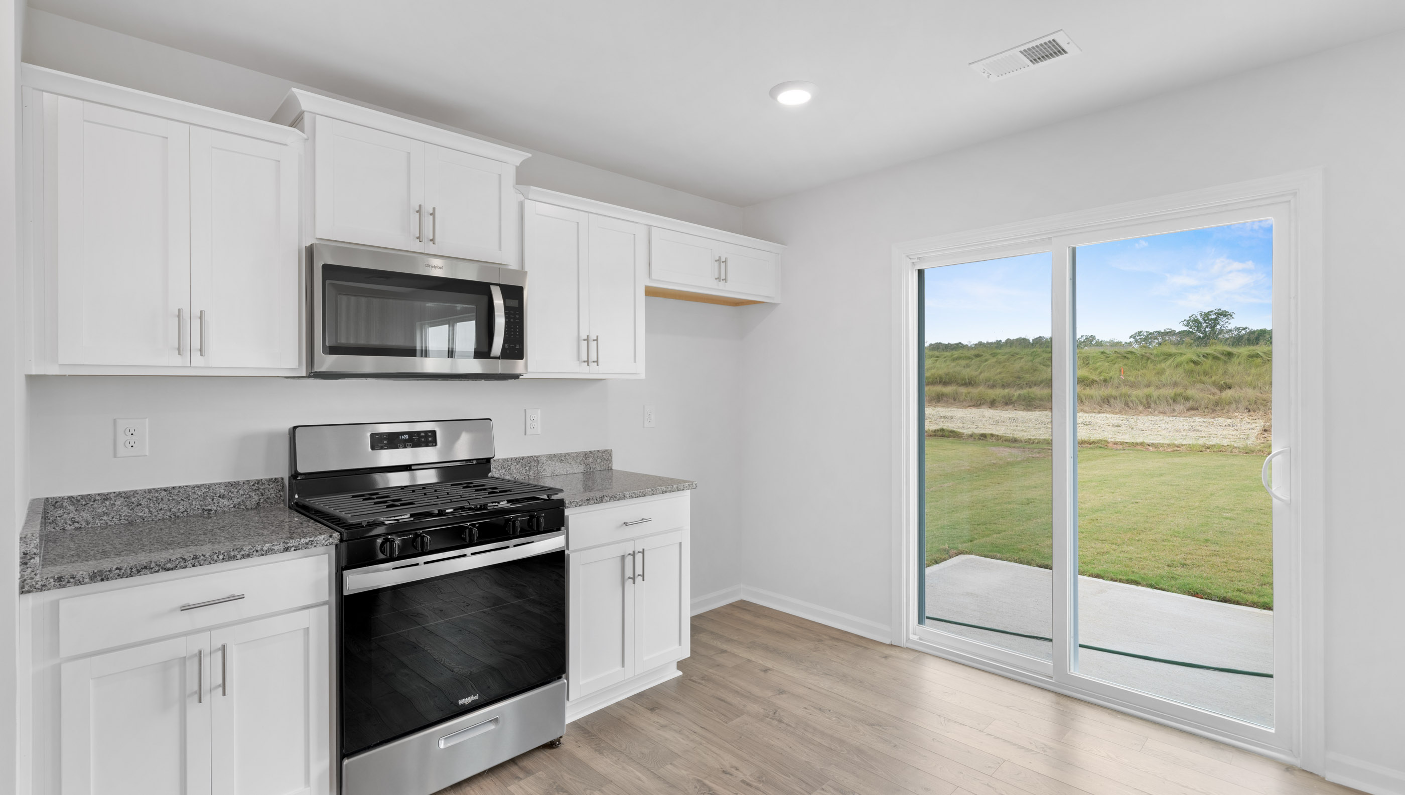 Kitchen with stainless steel appliances.