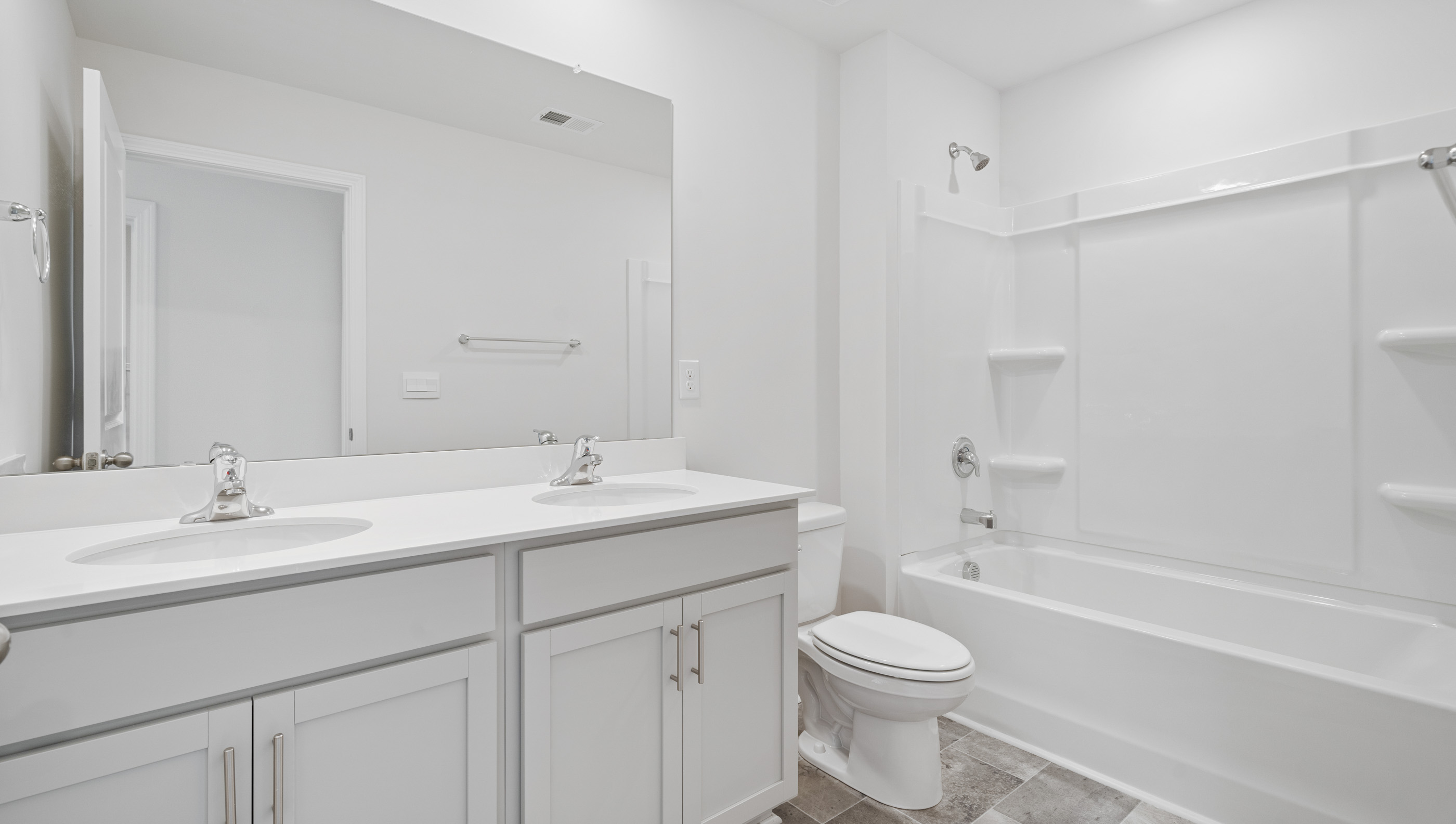 Bathroom with double vanity sink.