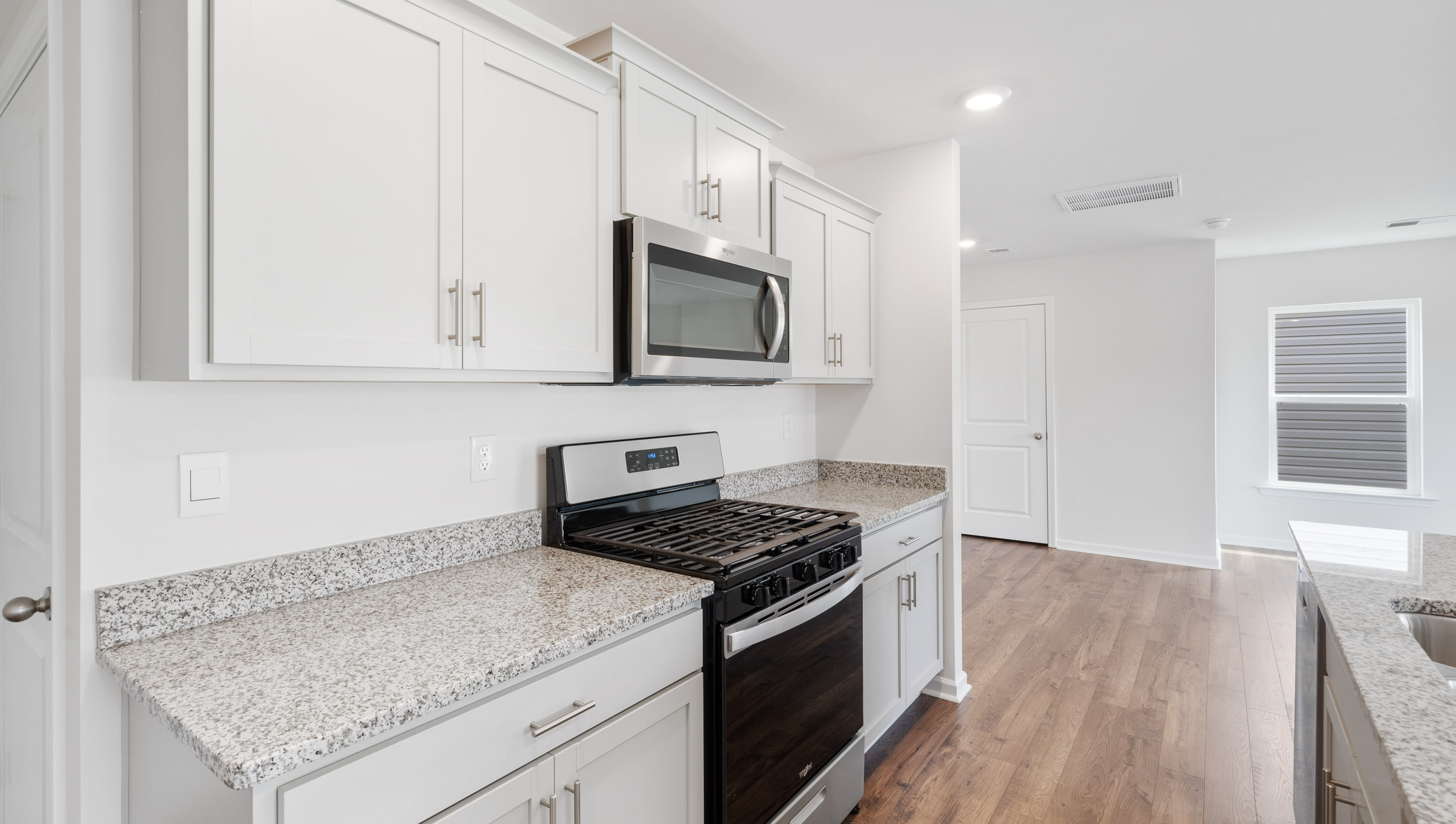 Kitchen with stainless steel appliances.