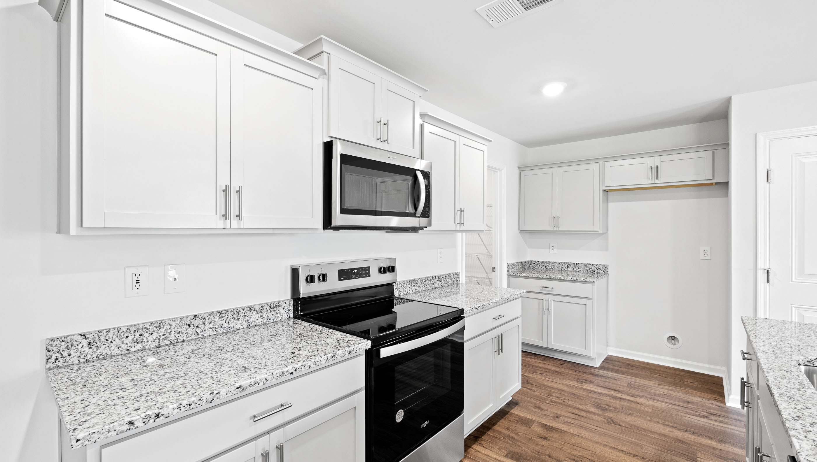 Kitchen with stainless steel appliances.