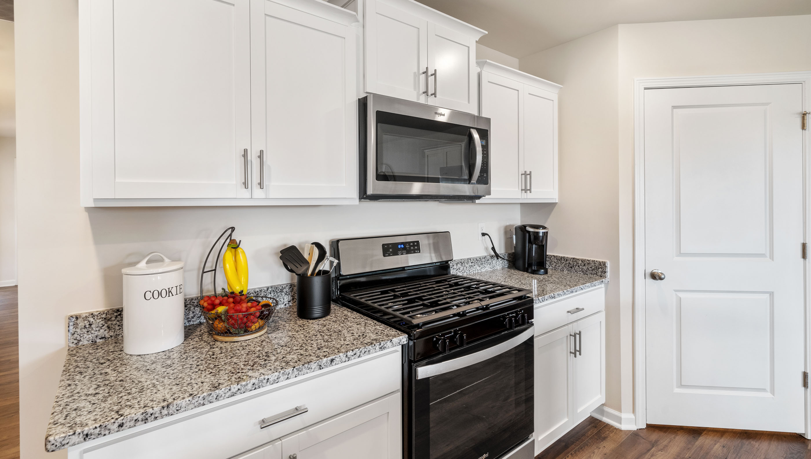 Kitchen with stainless steel appliances.