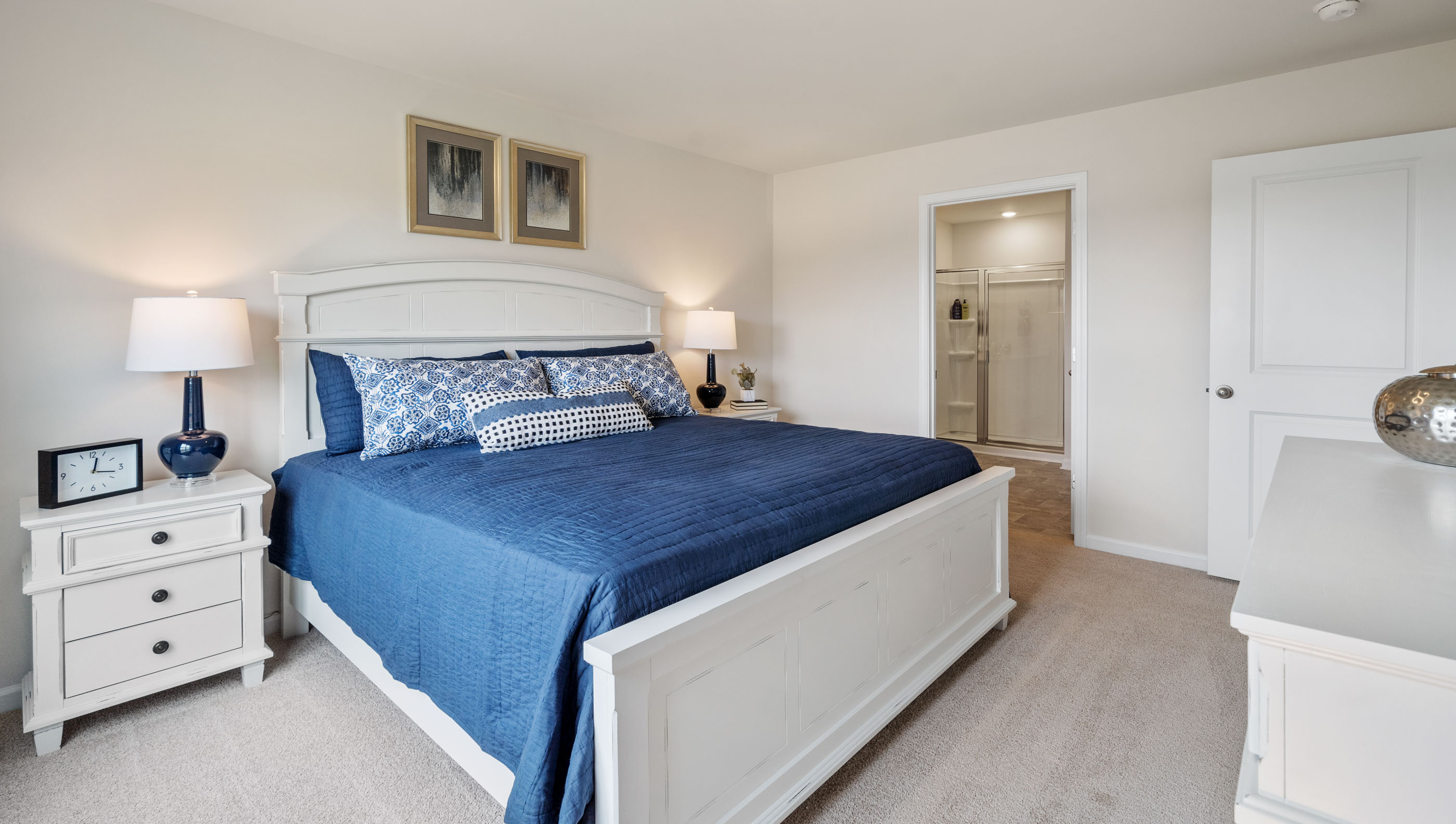 Bedroom with carpet and window.