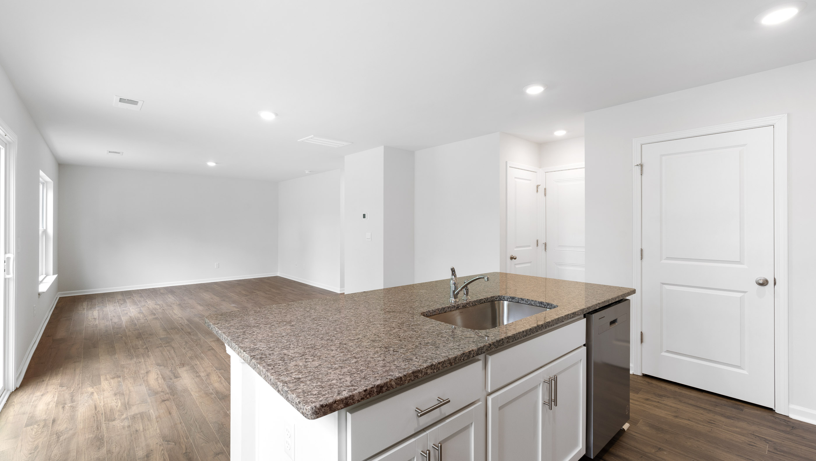 Kitchen with view of family room..