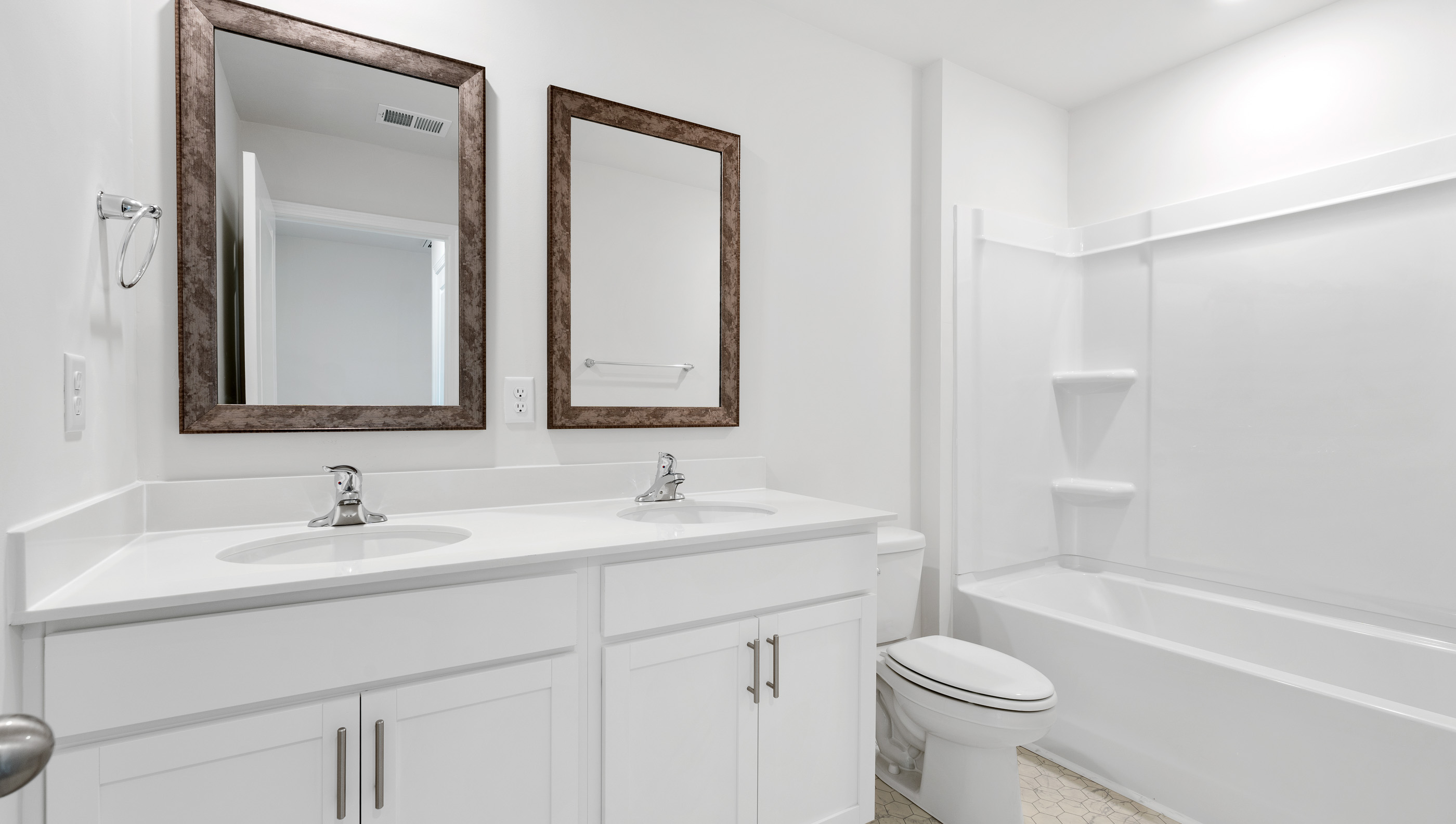 Bathroom with double vanity sink.