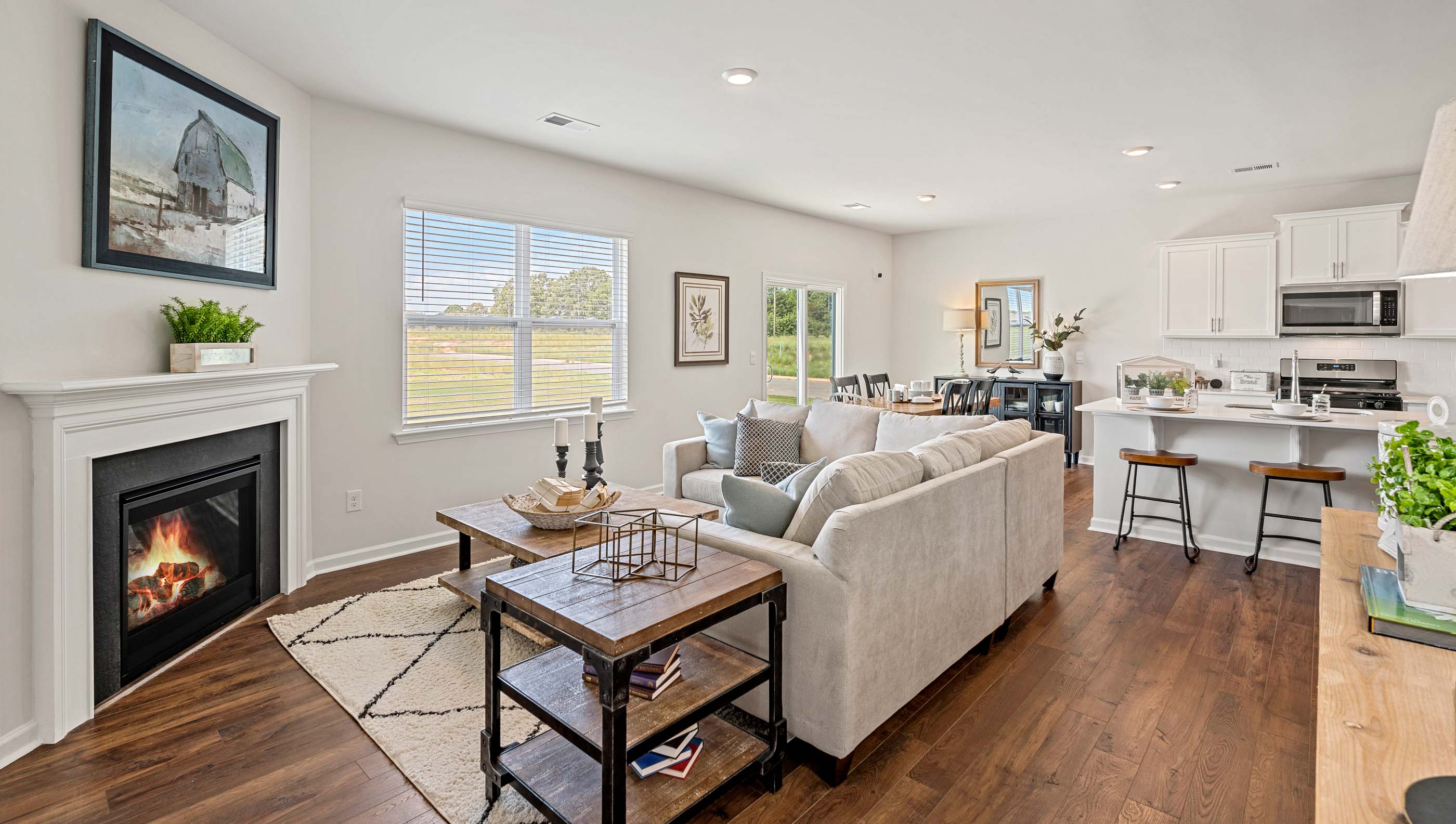 Family room with fireplace and windows.
