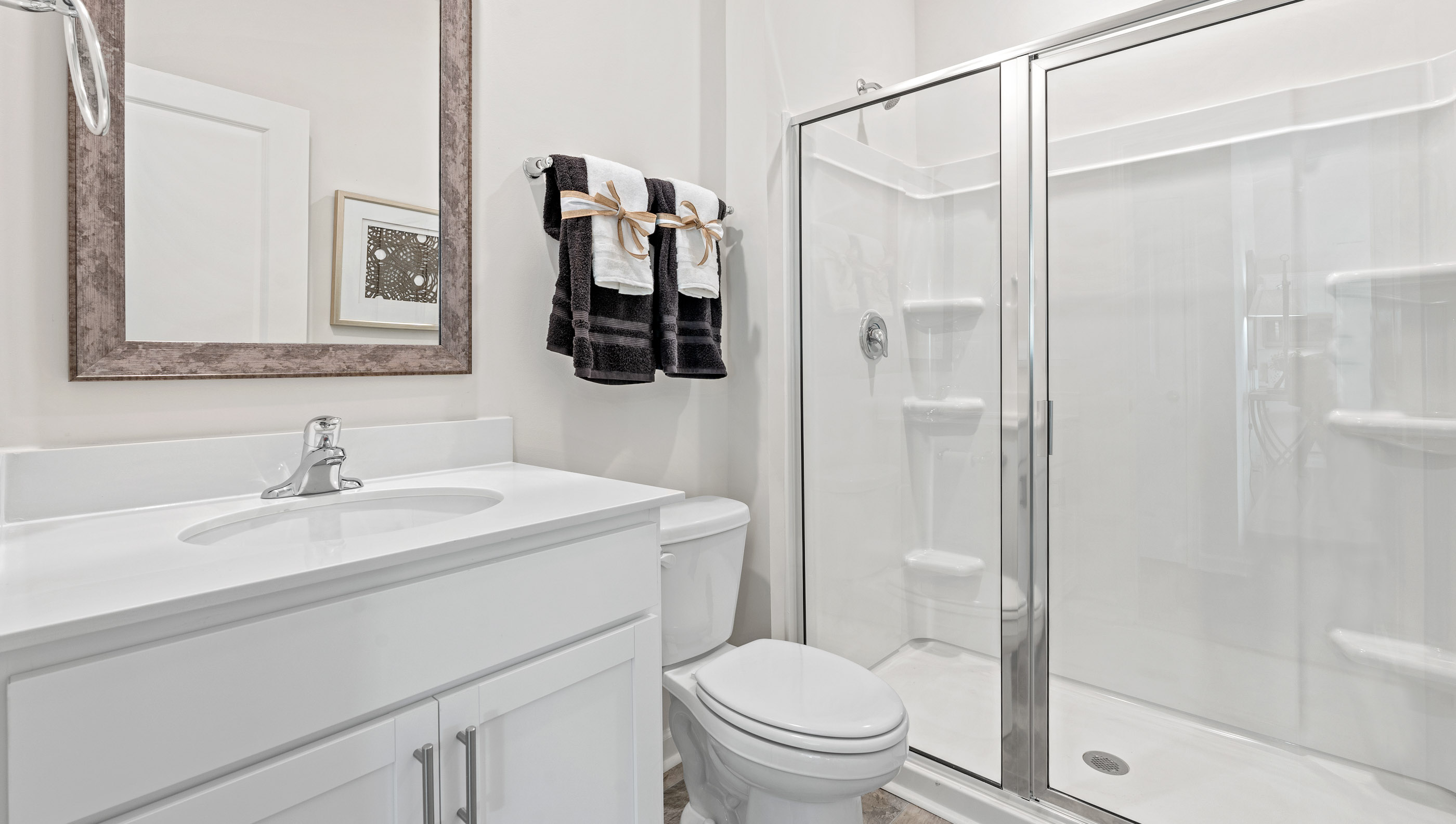 Bathroom with single vanity sink and shower.