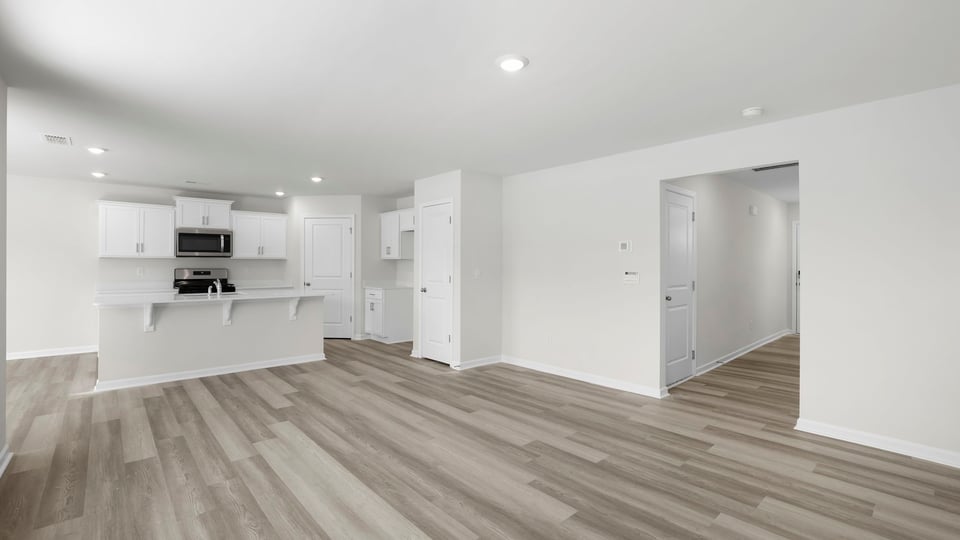 Kitchen with island and countertops.
