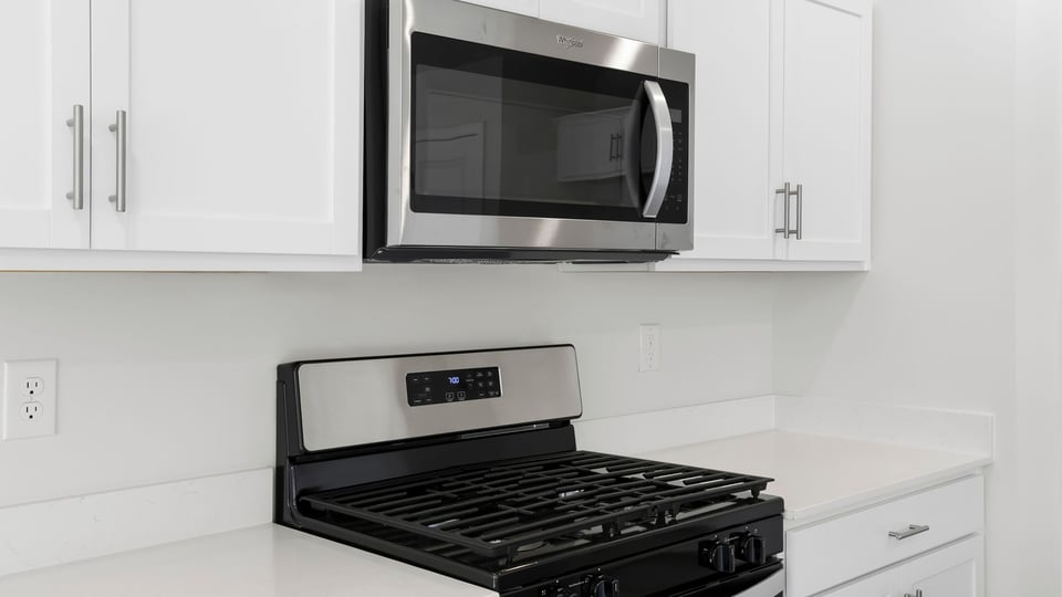 Kitchen with island and countertops.