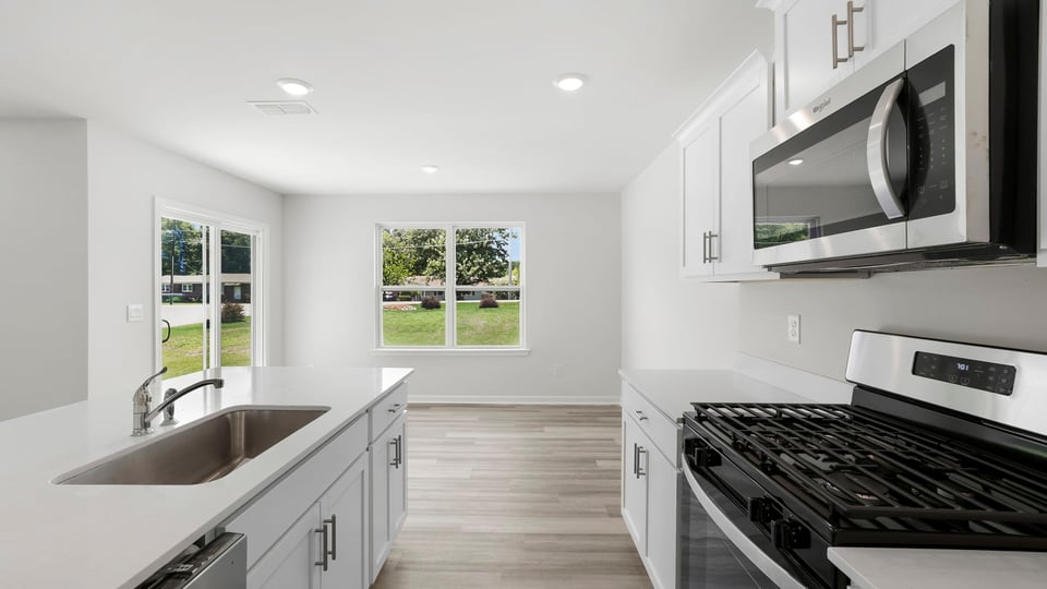 Kitchen with island and countertops.