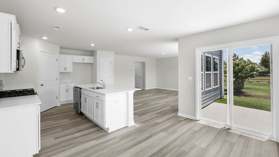 Kitchen with island and countertops.