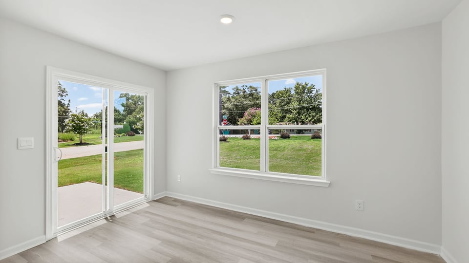 Dining room with sliding door.