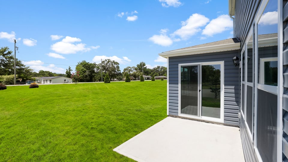 Large backyard of home.