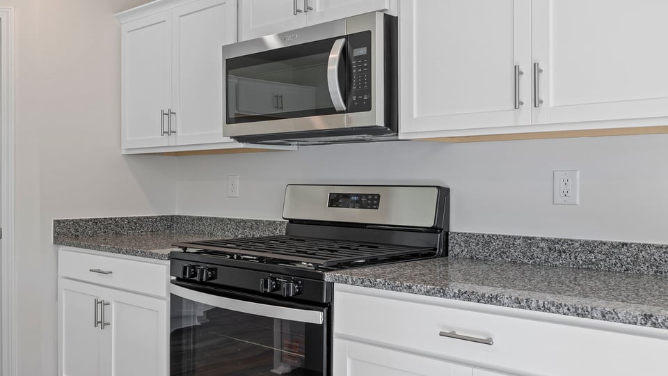 Kitchen with island and countertops.