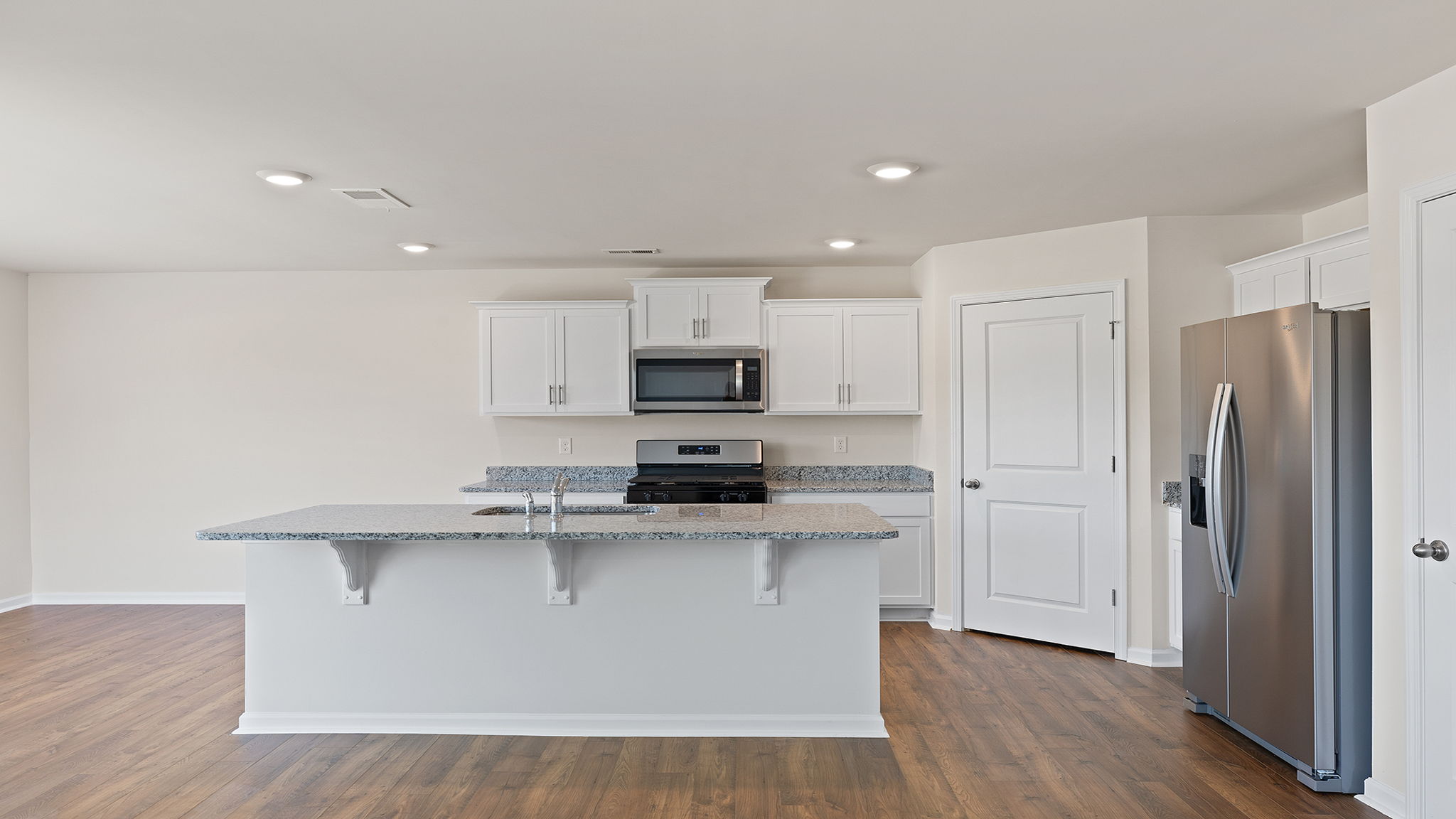 Kitchen with granite countertops.