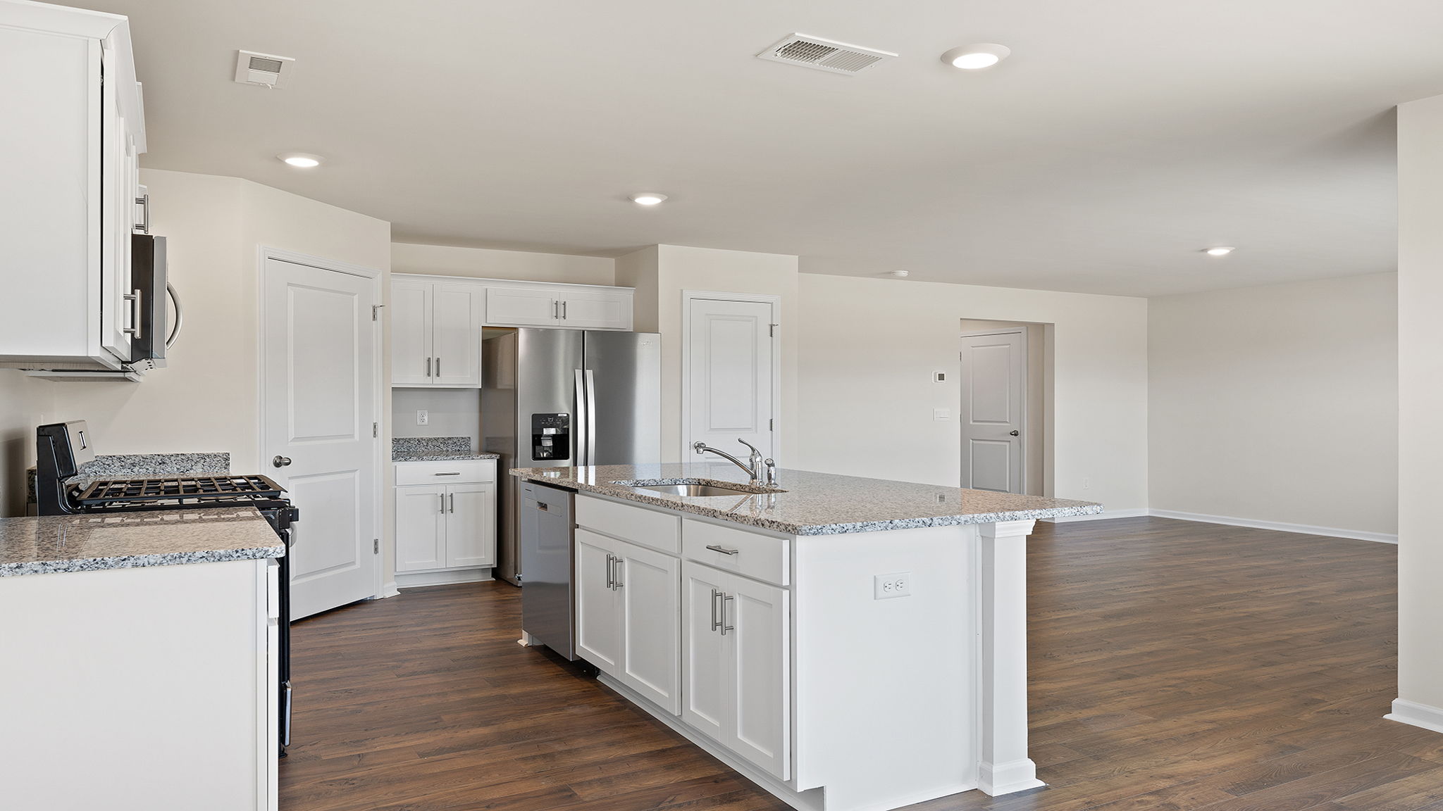 Kitchen with granite countertops.