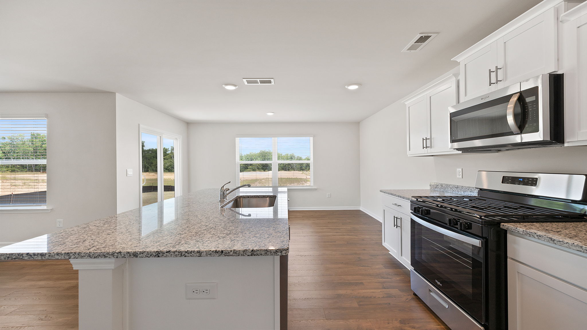 Kitchen with granite countertops.