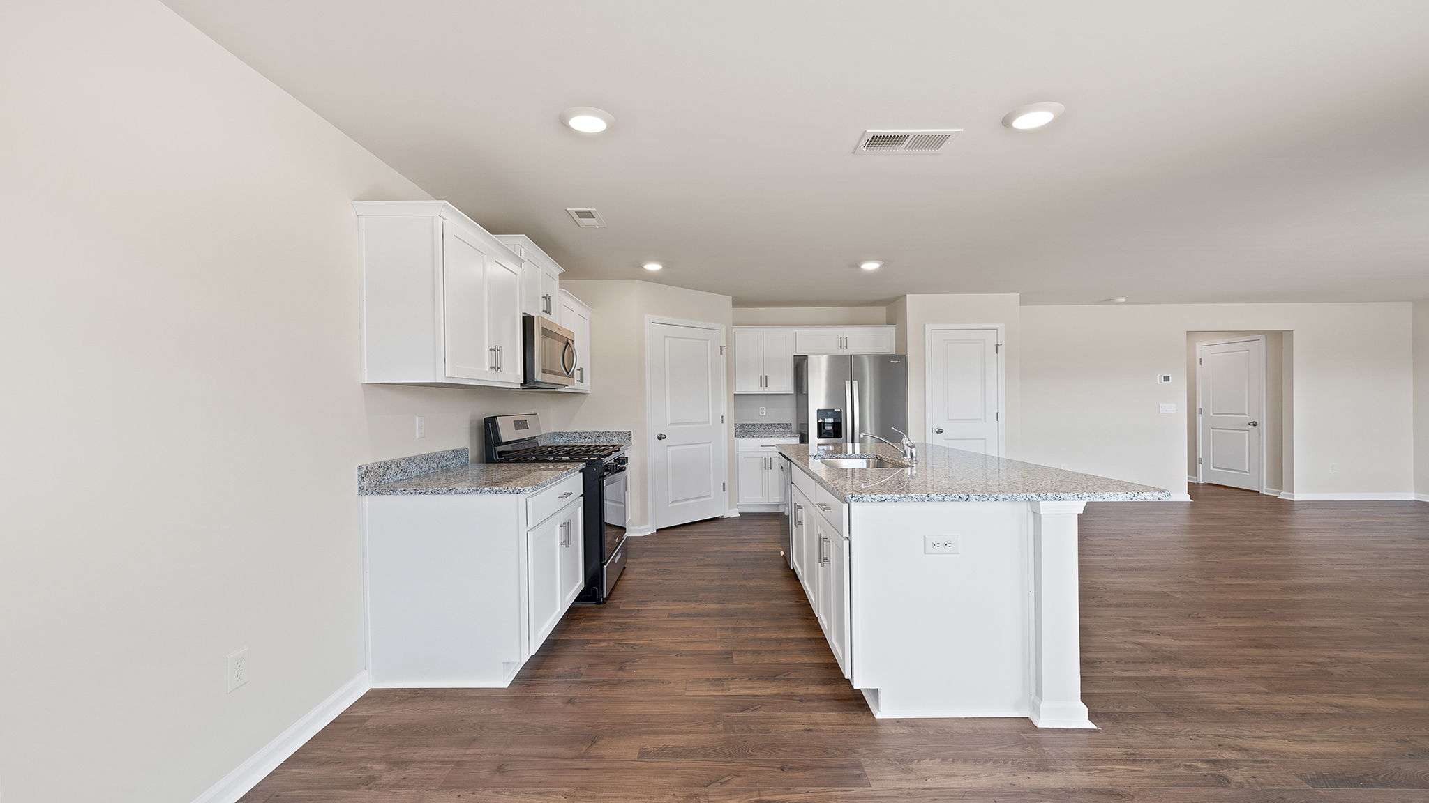 Kitchen with granite countertops.
