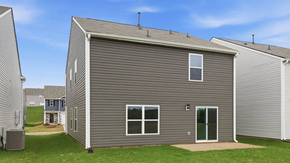 Large backyard of home.