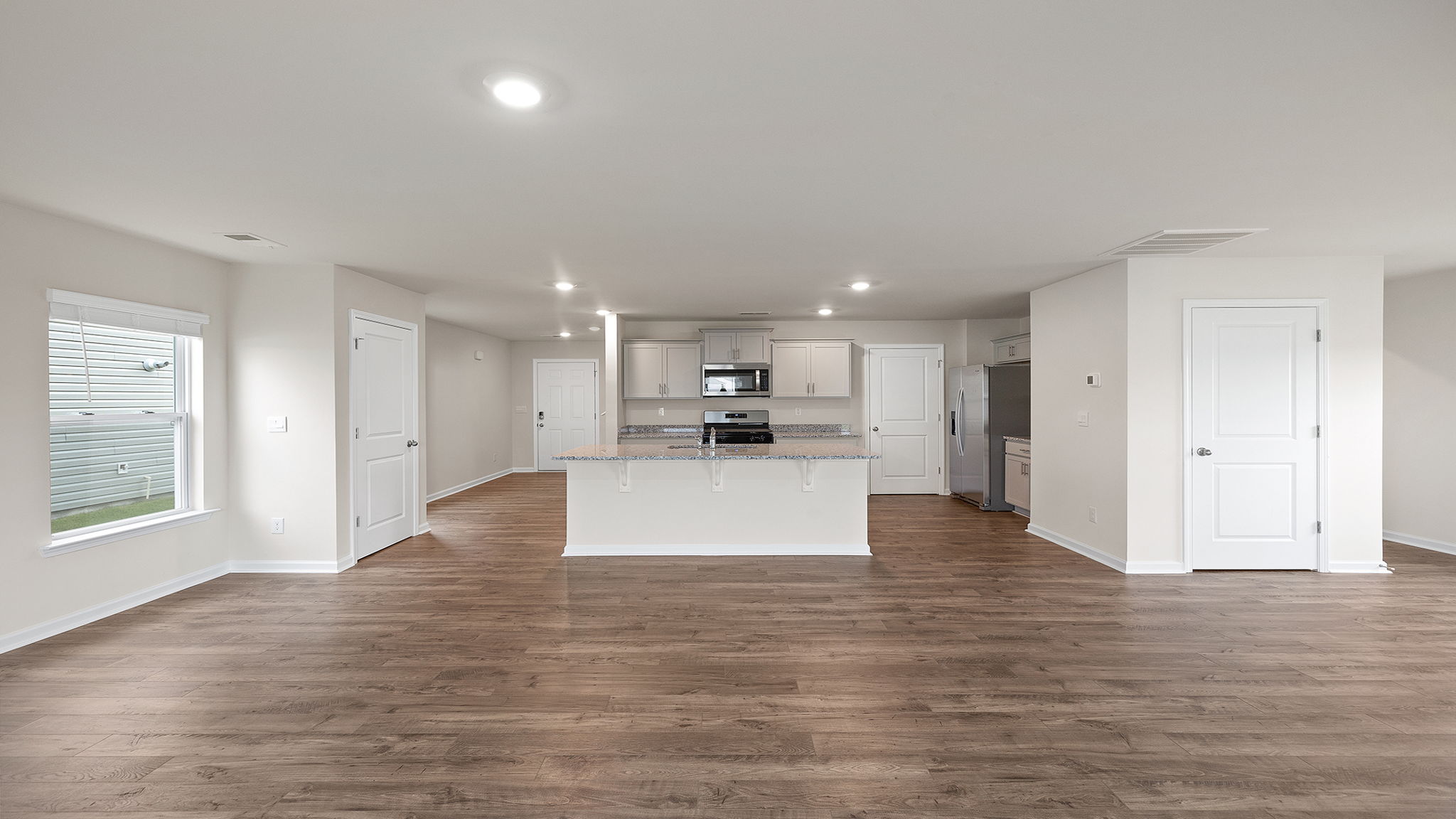 Kitchen with island and countertops.