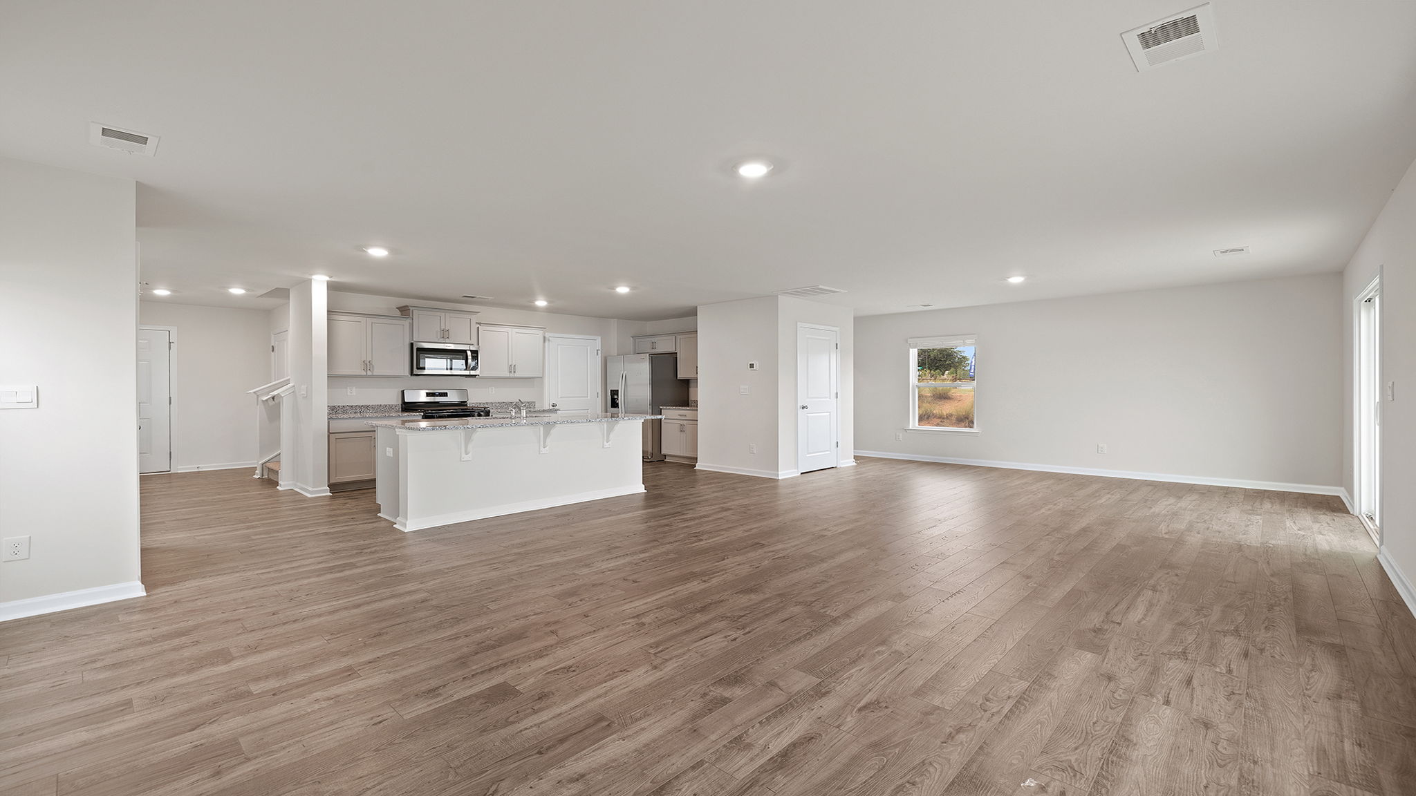 Kitchen with island and countertops.