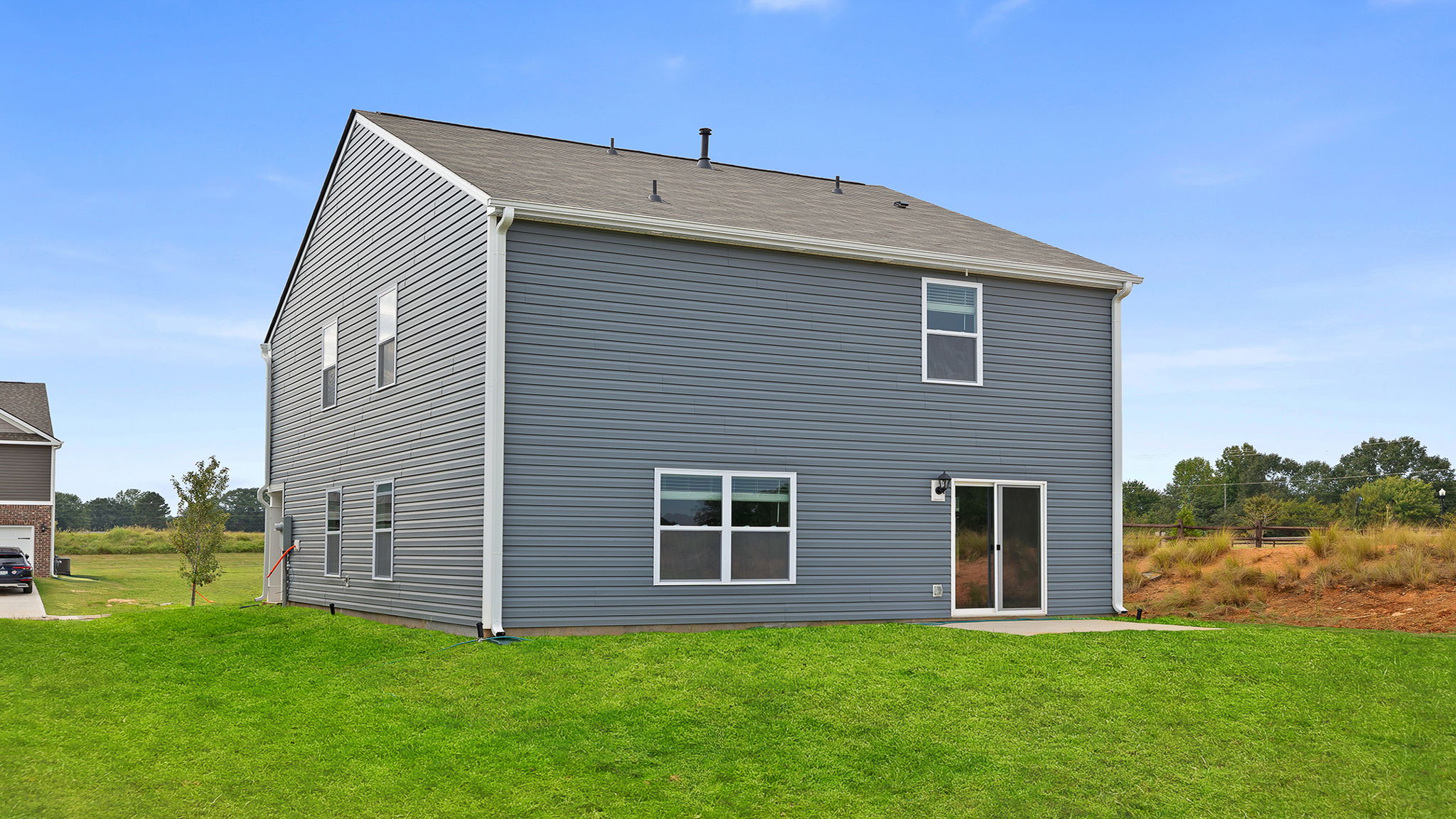 Large backyard of home.