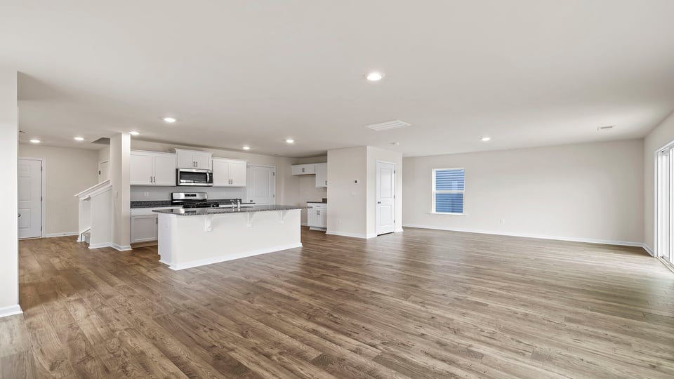 Kitchen with island and countertops.