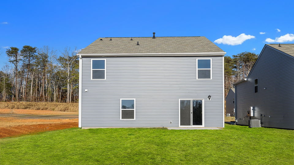 Large backyard of home.