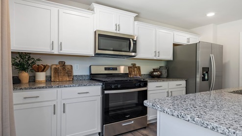 Kitchen and island with granite counter tops