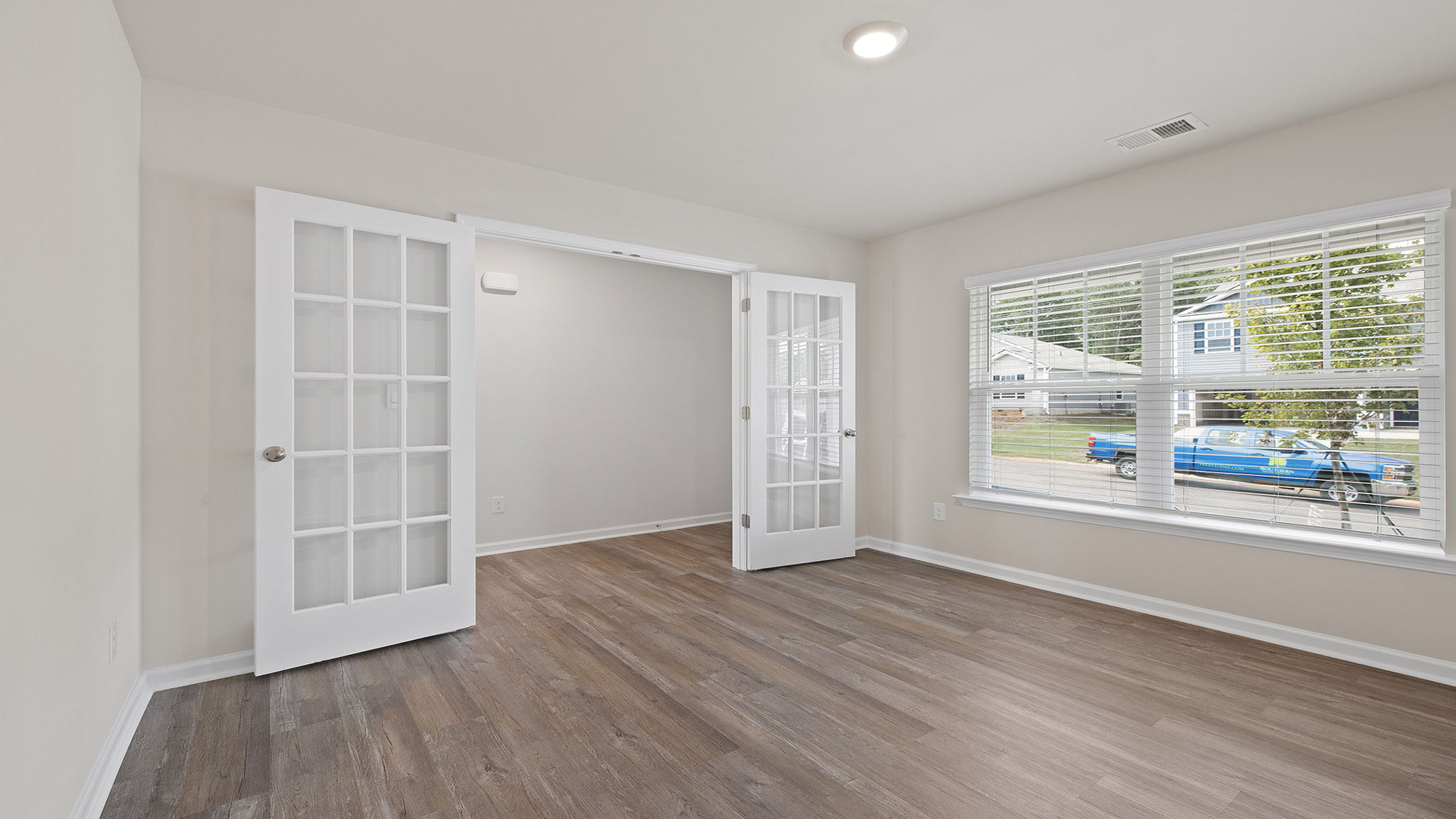 Flex room with french doors.