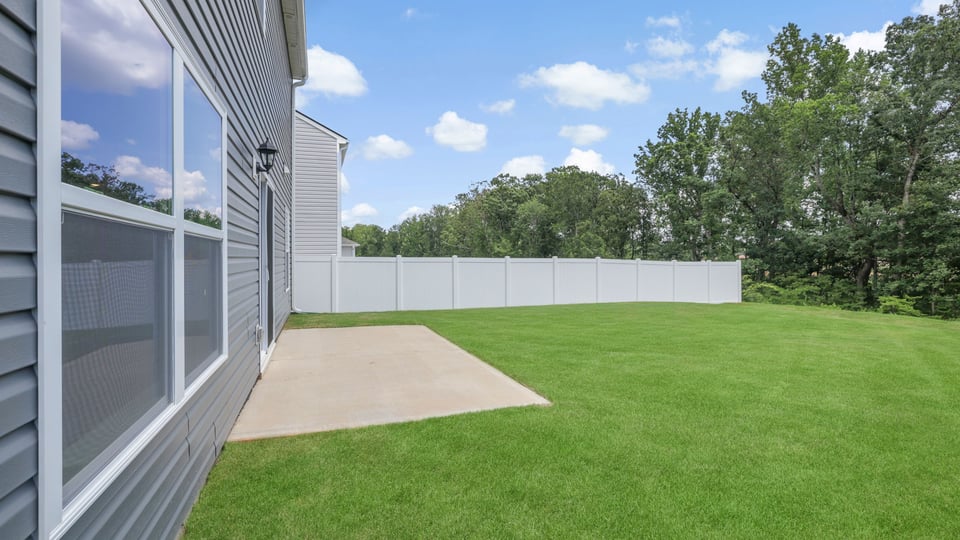 Large backyard of home.