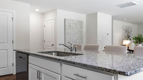 Kitchen and island with granite counter tops