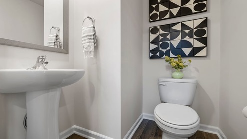 Half bathroom with mirror